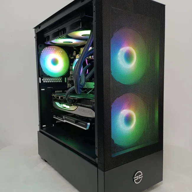 Black gaming PC with illuminated fans and visible graphics card