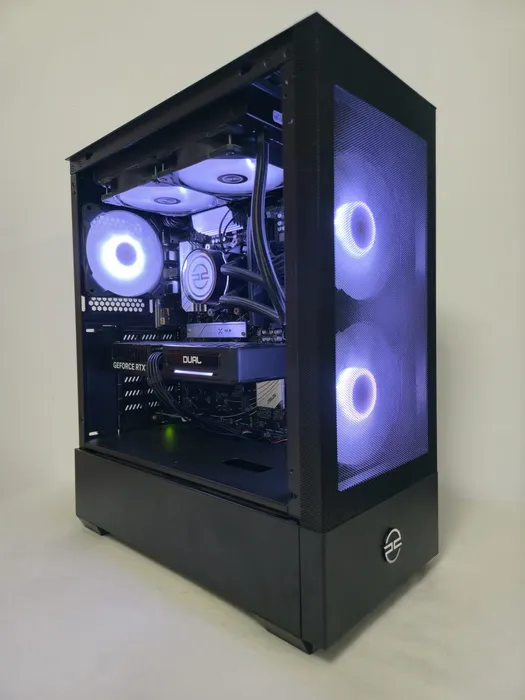 Black PC with two purple illuminated front fans and an open side
