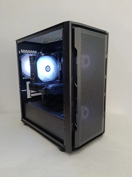 Black mesh-front computer with its internal hardware visible
