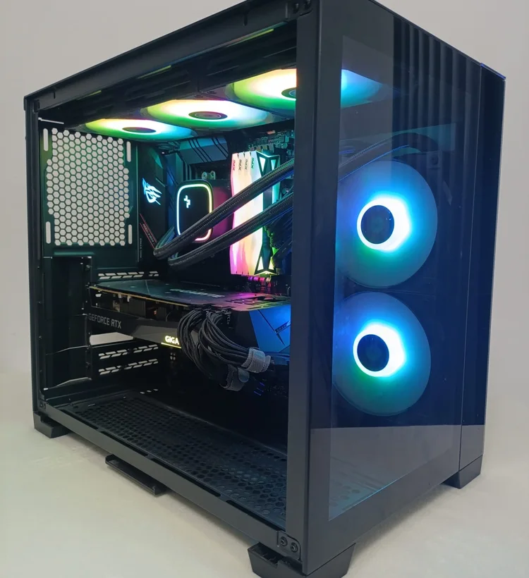 Apex PCs black gaming build with blue-lit front fans and a glass side panel